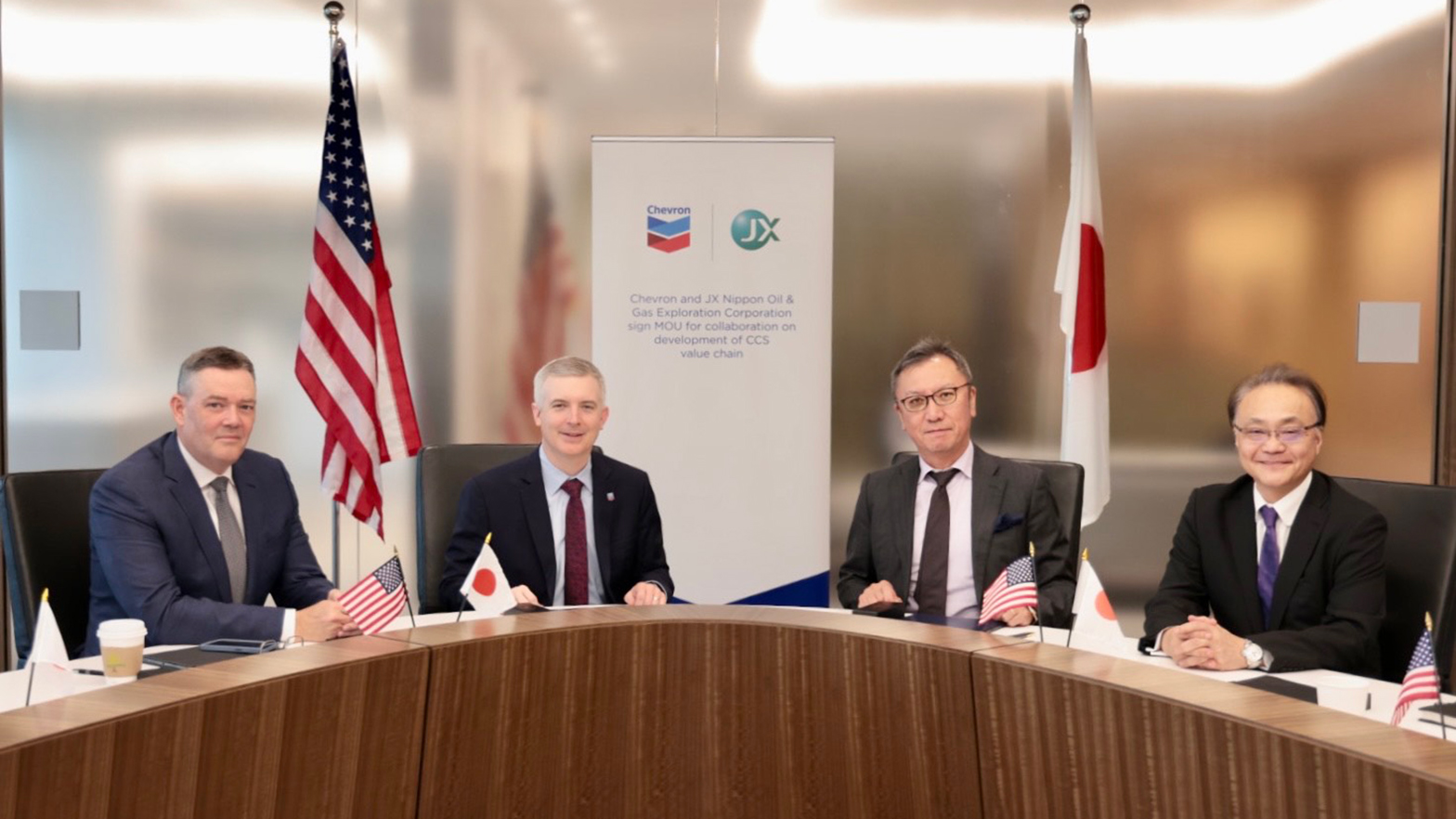Jeff Gustavson and Chris Powers sign MOU for collaboration of development of CCS value chain.