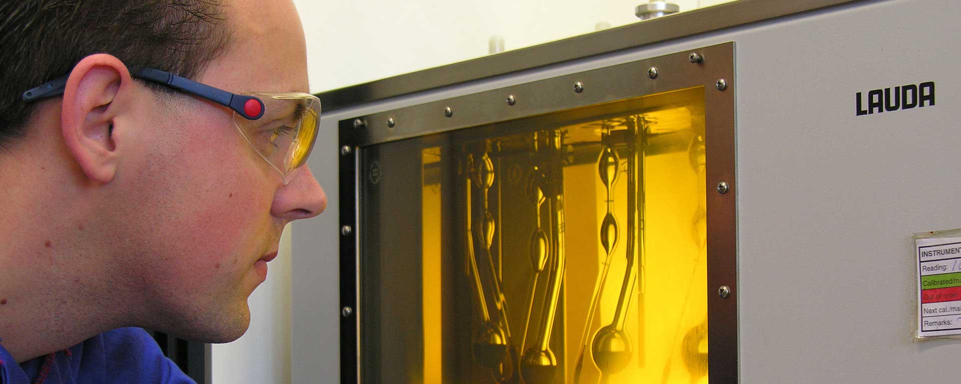 Scientist looking at oil in the netherlands