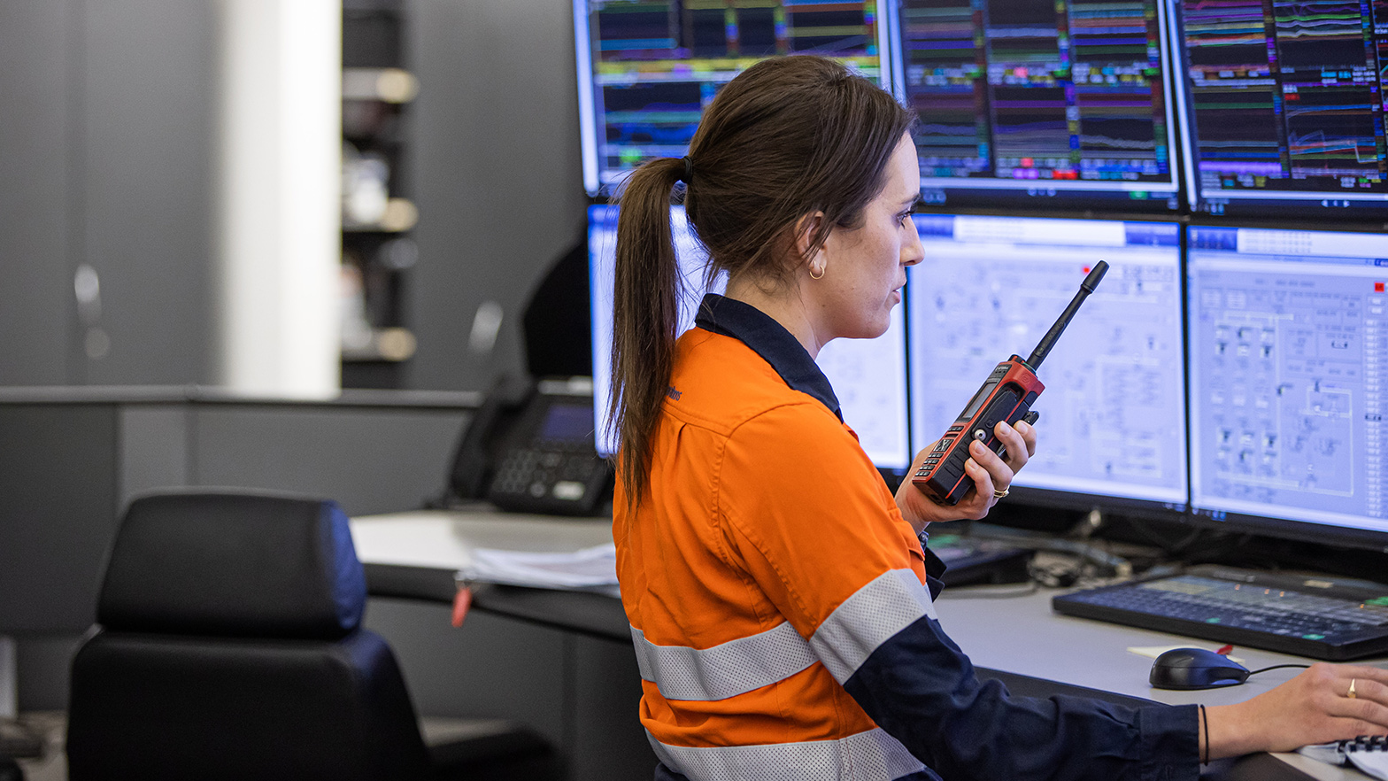 Workers at the Wheatstone Project central control room monitoring and operating the LNG facility.