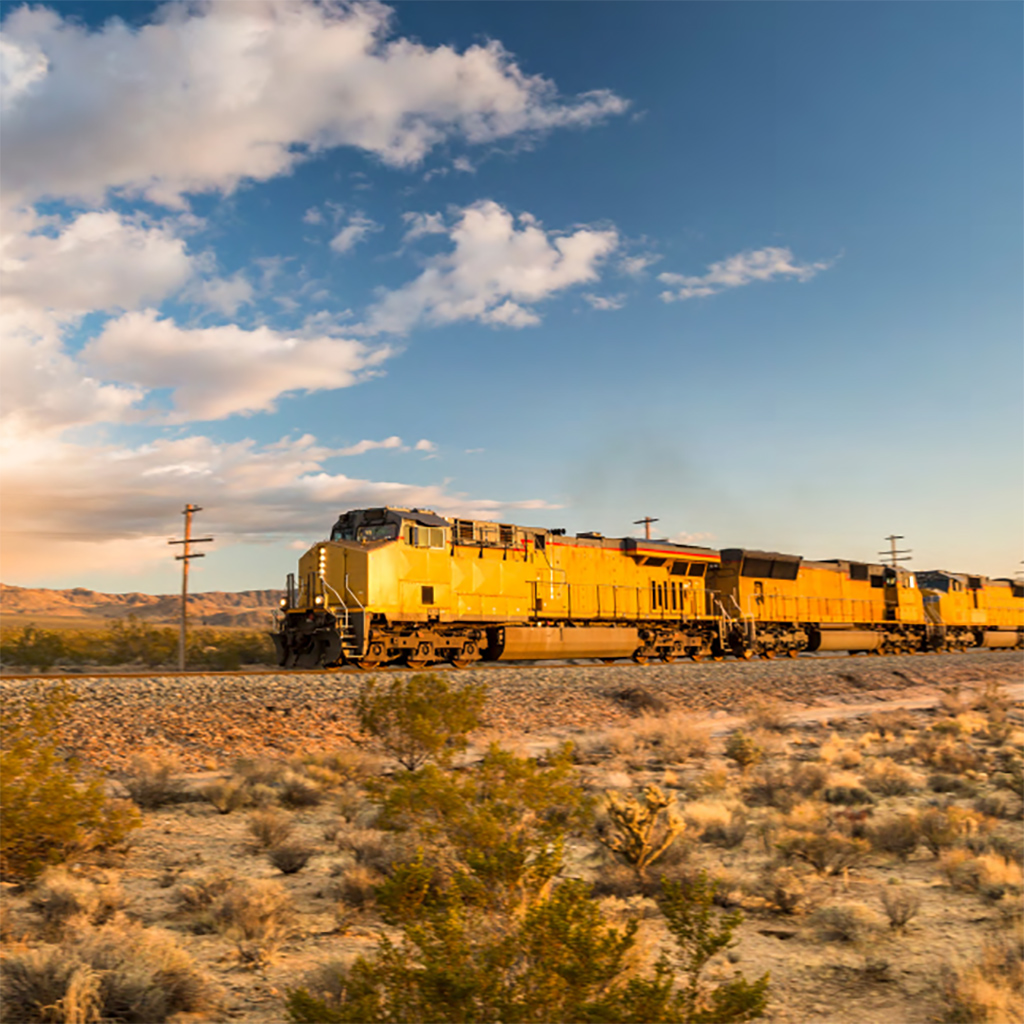 Cargo train rolls through the desert